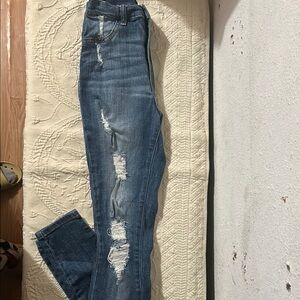 Fashion Nova High Rise Blue Jeans with Distressed Details